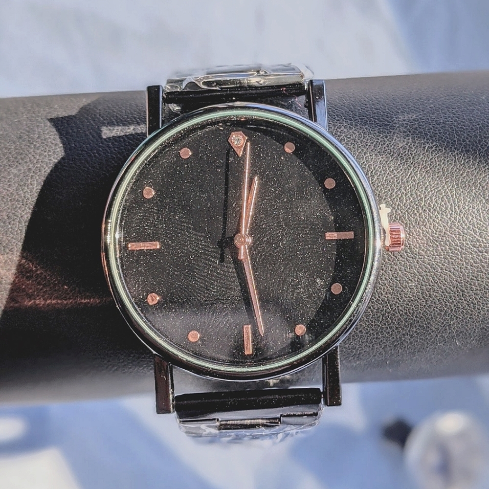 Unisex Black and rose gold watch!
